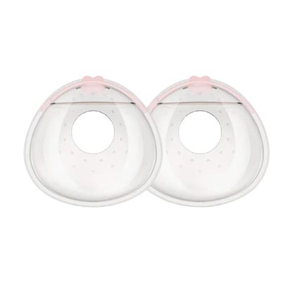 Paire de recueil de lait maternel en silicone transparent avec joint rose. À glisser dans le soutien-gorge pour récupérer le lait durant la journée.